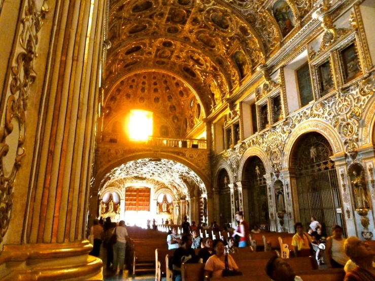 a cathedral with a very large ceiling and ornate arches