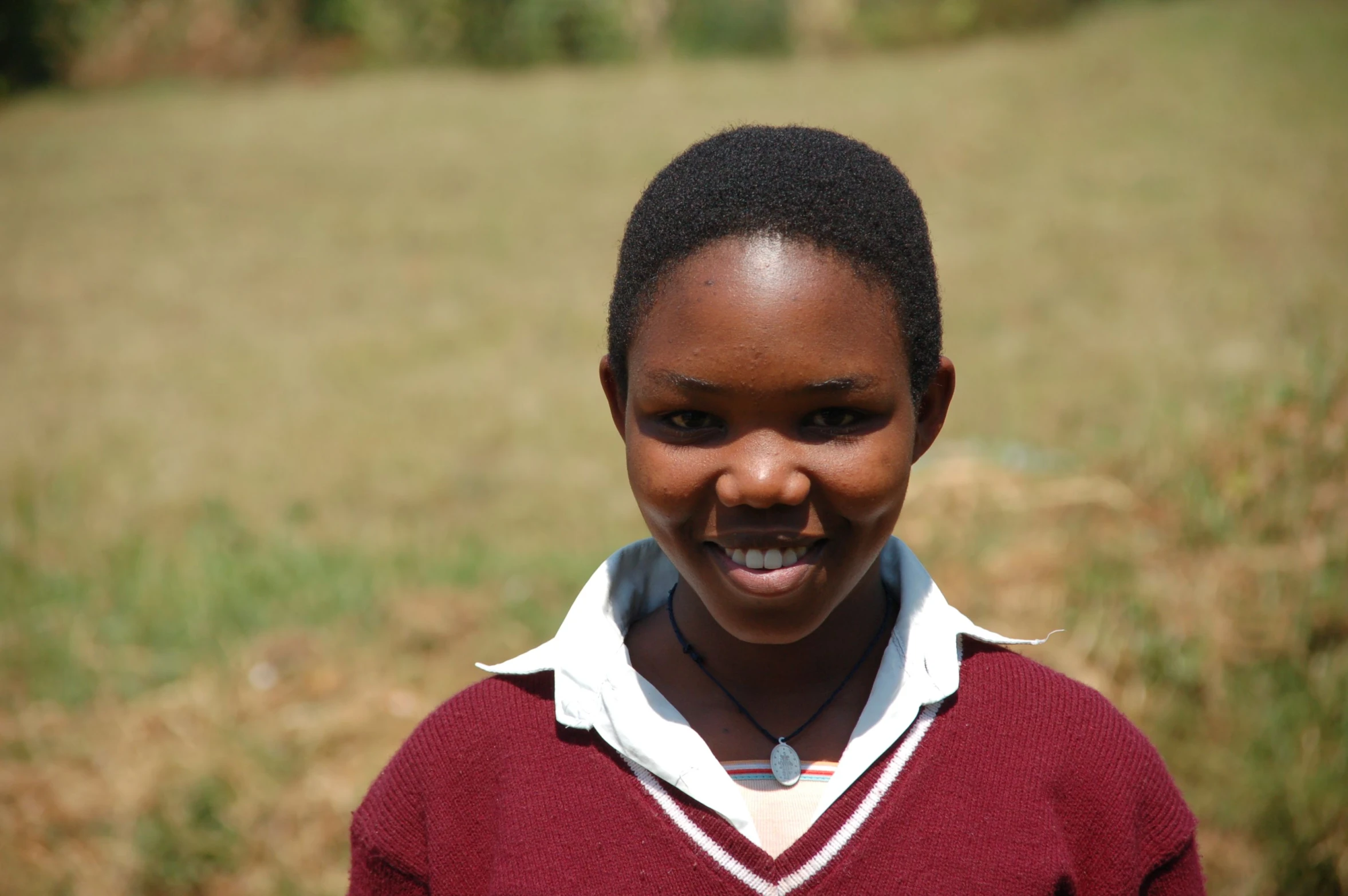 a close up of a young person with an african american