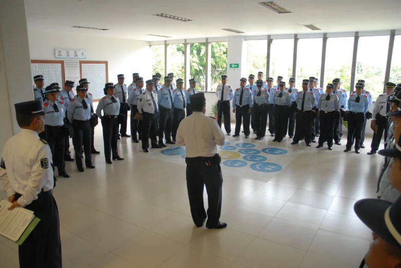 the officers are lined up for a picture together