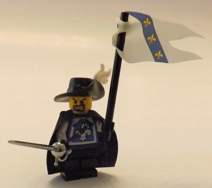 a lego figure holding a small flag in a white room