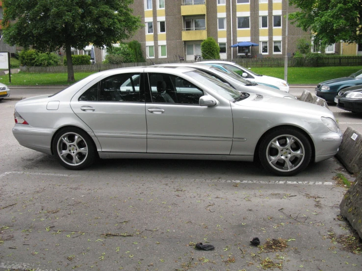 a silver car is parked in a spot