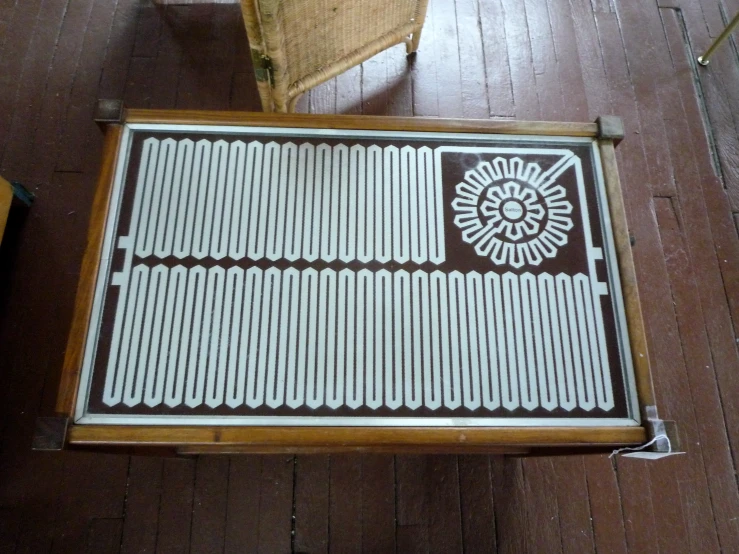 an elevated view of a coffee table and chair