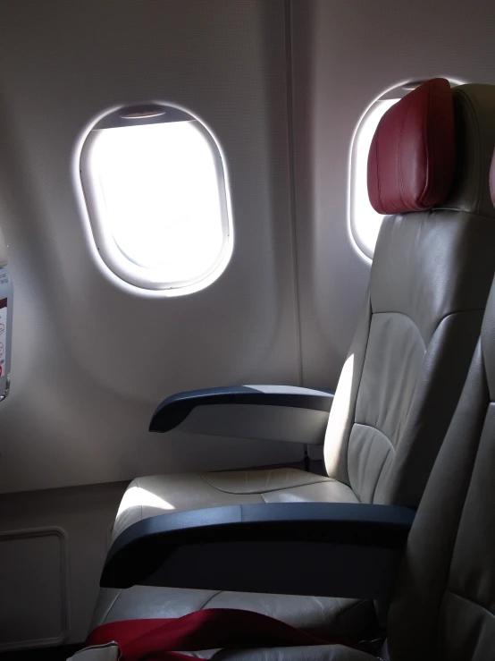 two seats in the back of an airplane