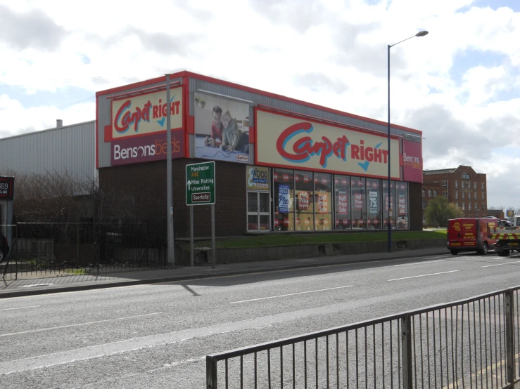 the store fronts on the street corner of the city