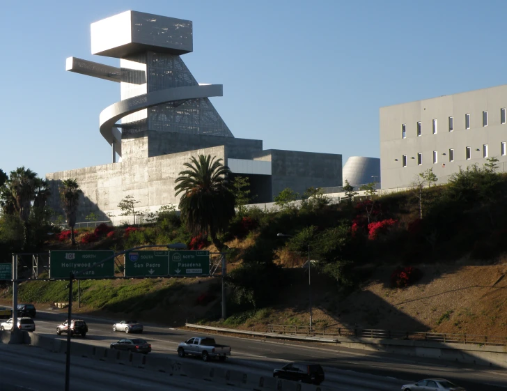 a modern building with many street lights on top