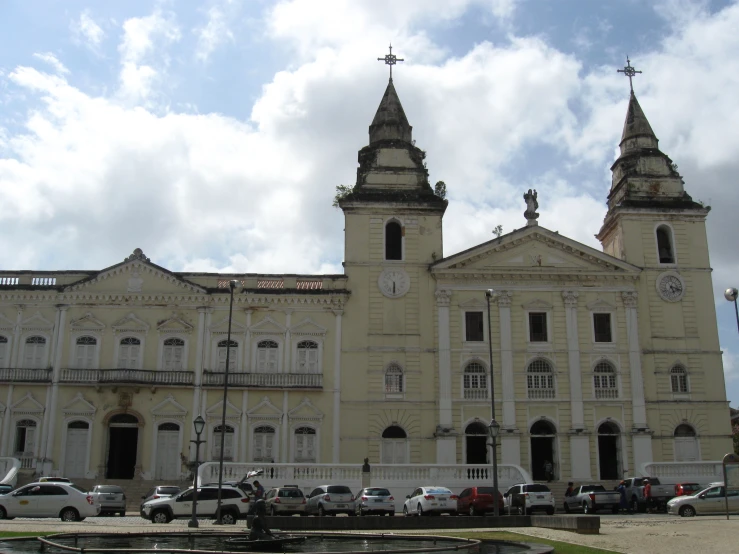 the two spires in the building have steeples