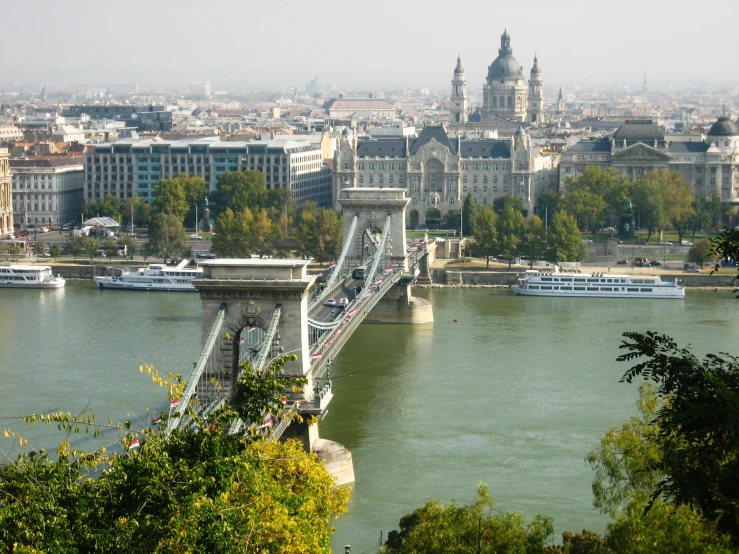 view from a hillside of old paris bridge and other tourist'attractions