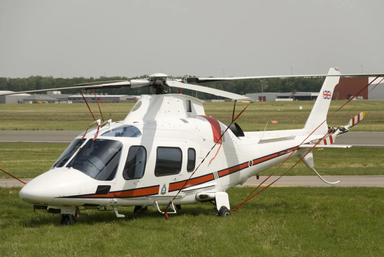 an aircraft that is sitting in the grass