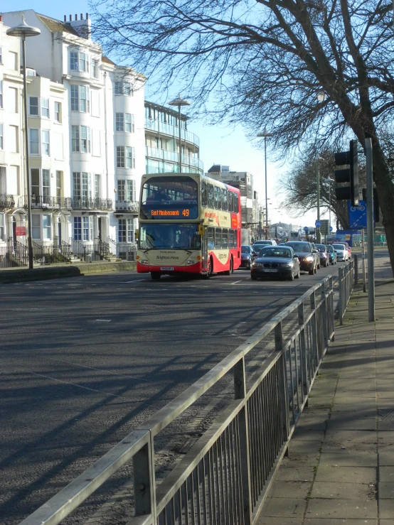 two buses passing each other on the same street