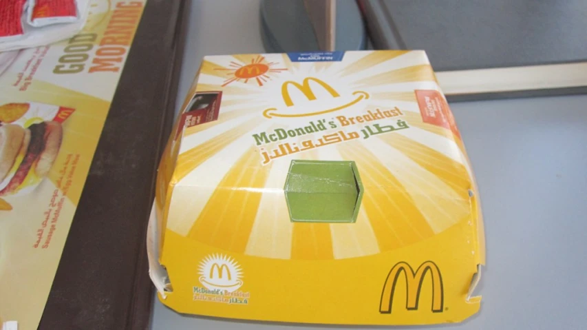 a box of mcdonald's breakfast food sitting on a counter