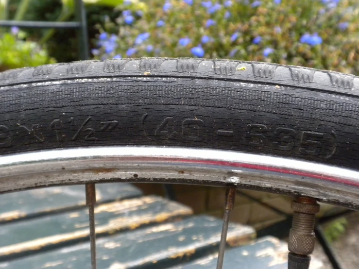 a view of the wheel and tire of a bicycle