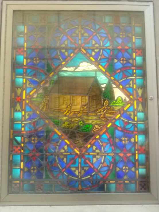 the back of a colorful stained glass window