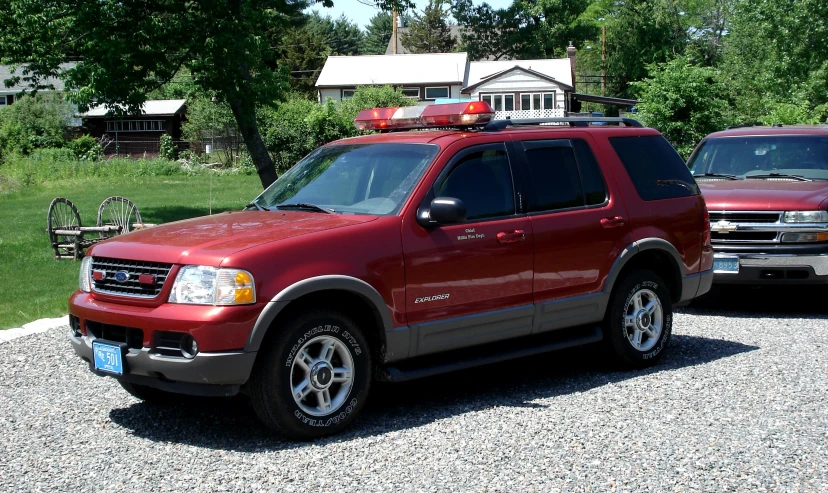 a red truck with a life preserver on top