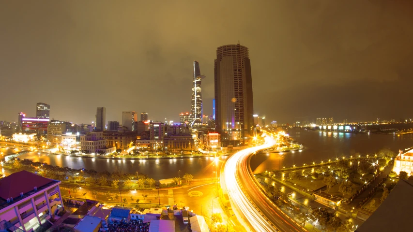 a view of an urban city and its surrounding streets at night