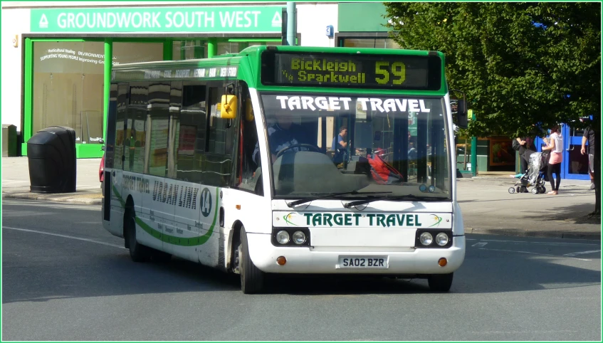 a bus riding down the street in traffic