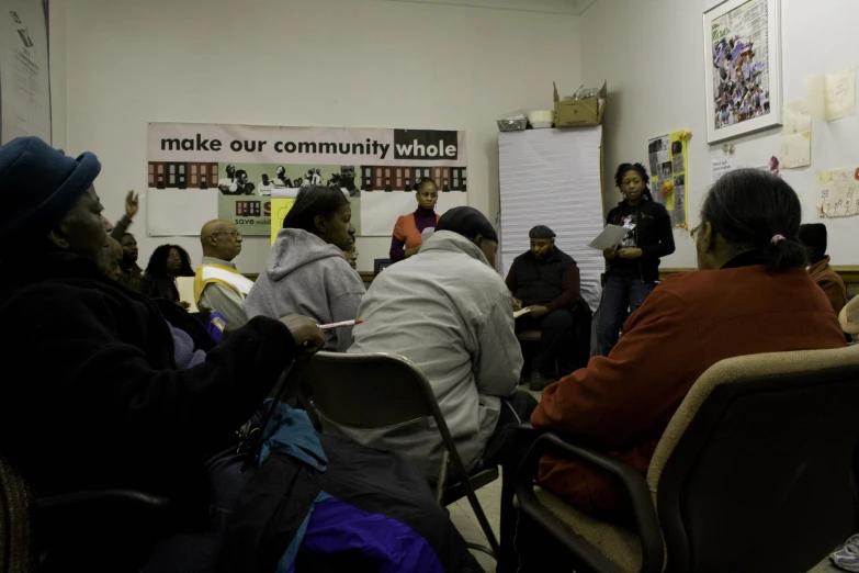 a group of people seated in a room together