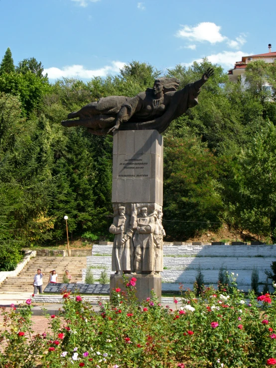 there is a statue with birds on top