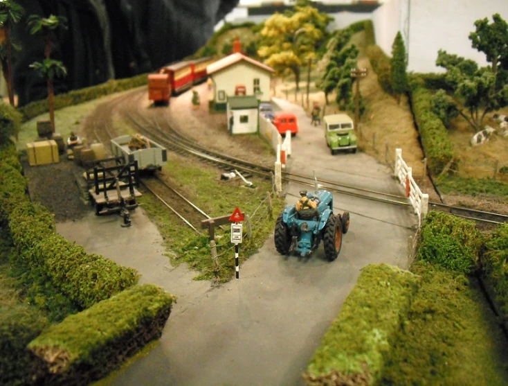 small model train tracks that have toy trucks