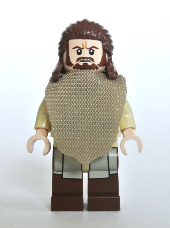 a lego figure with a beard and brown outfit