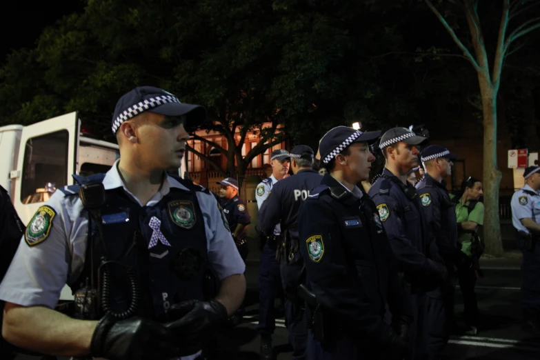 several police officers standing next to each other