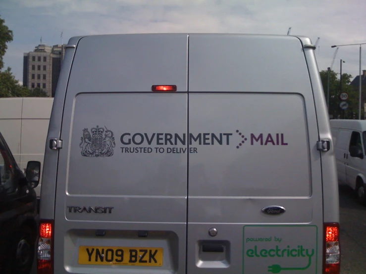 a van has the words government mail printed on it