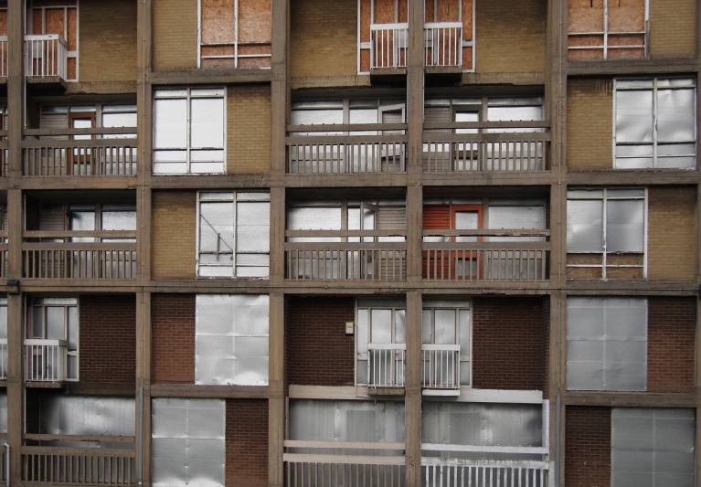 a large building with lots of windows and balconies