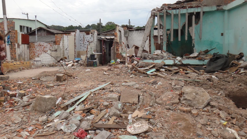 an old dilapidated building filled with rubble and rocks