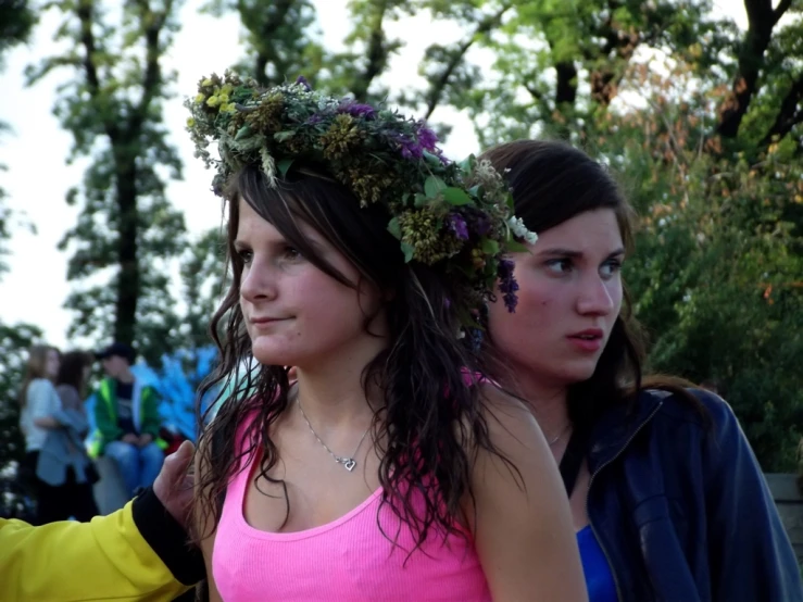 two s with wreaths on their hair