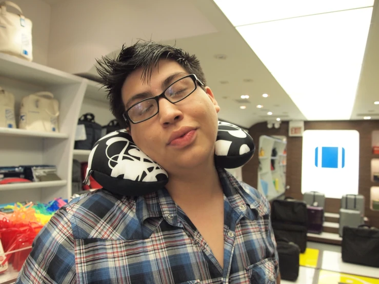 a man in a store wearing a mask on his head