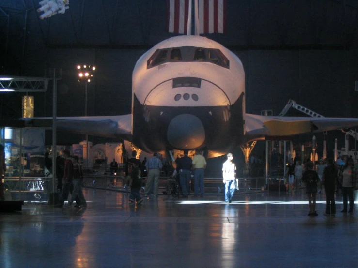 a space shuttle is on display in an air and space museum