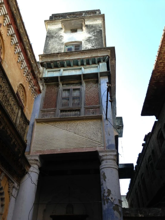 a tall clock tower next to a building