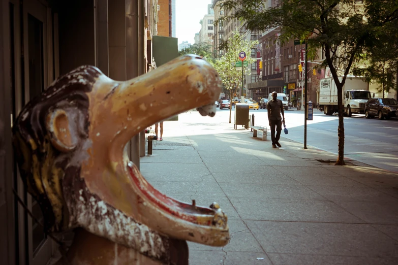 a statue of an animal is painted to resemble a alligator