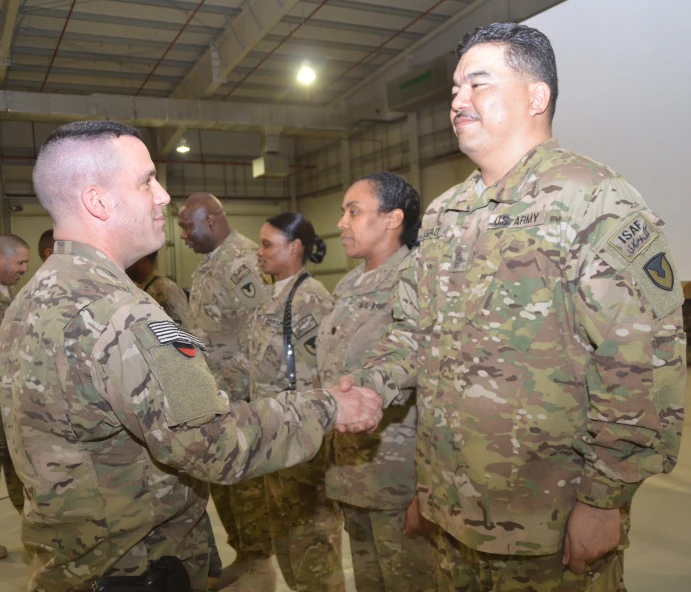 a group of men standing next to each other