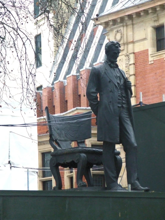 a statue of the famous james bonder on the side of the building