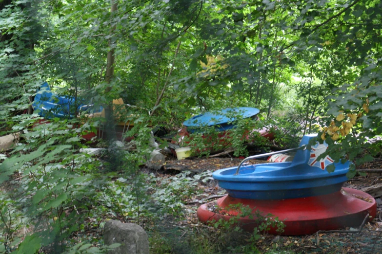 a small park that has many colorful benches