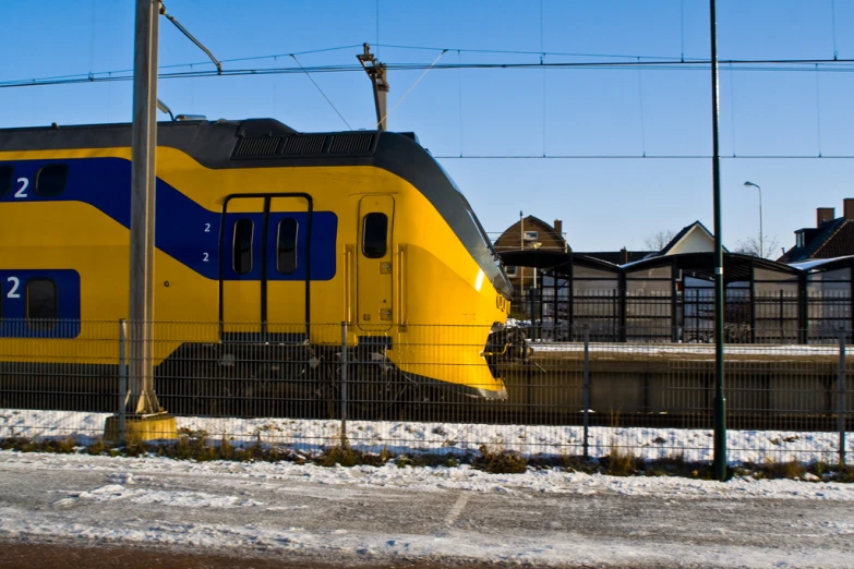 the train has arrived at the station in winter