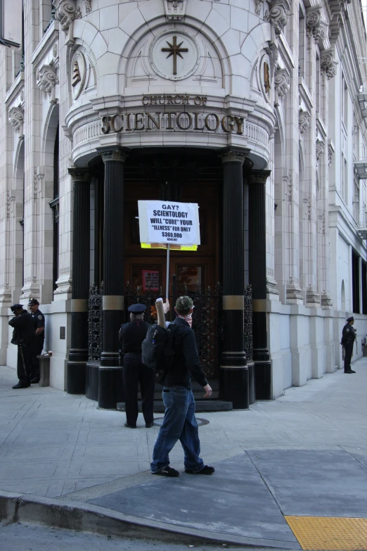 people are standing in front of an establishment