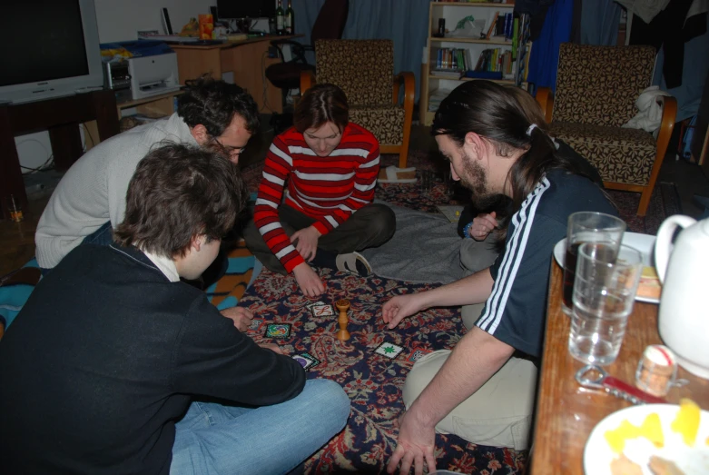 a group of friends is playing a game together