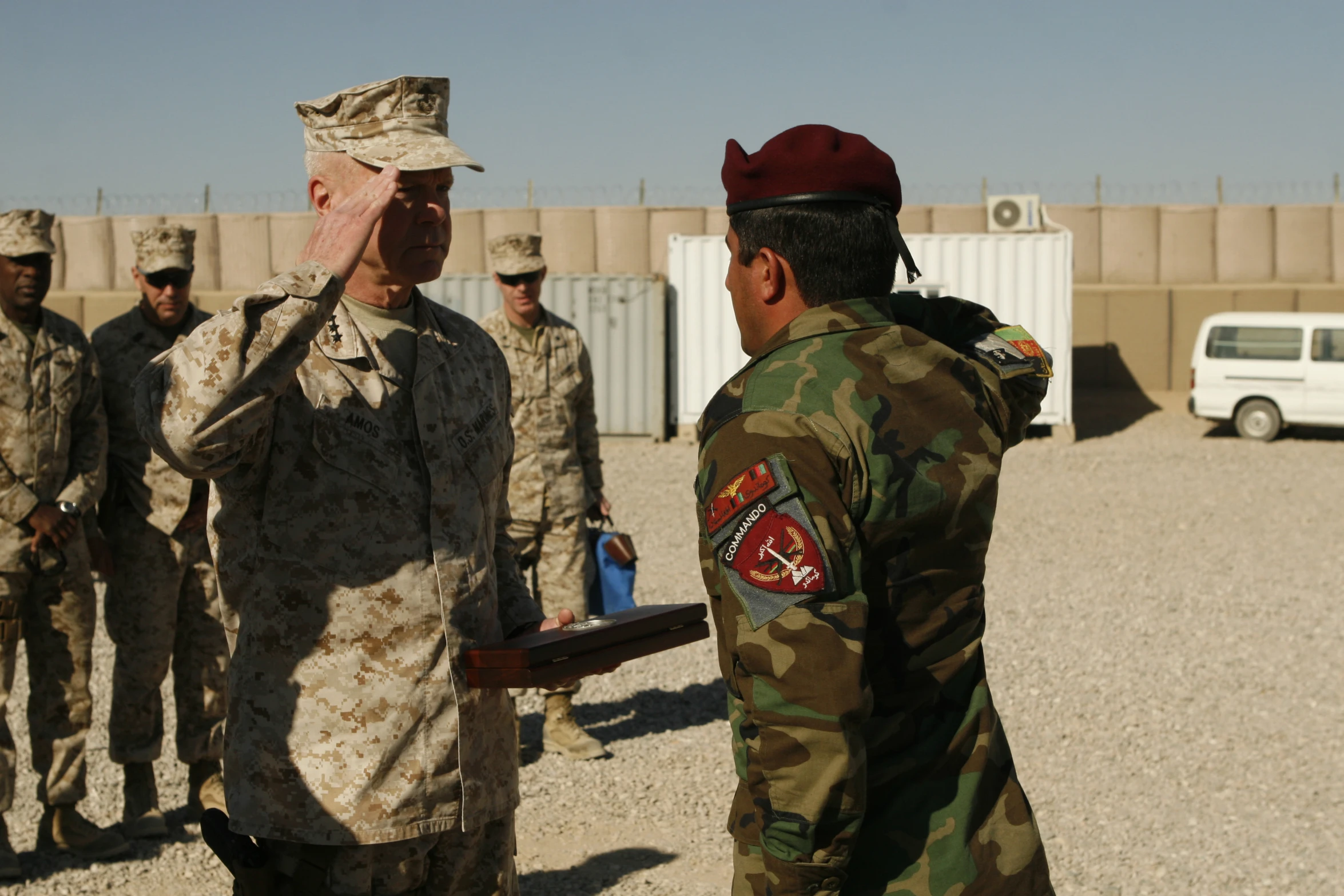 soldiers are seen standing in front of a group