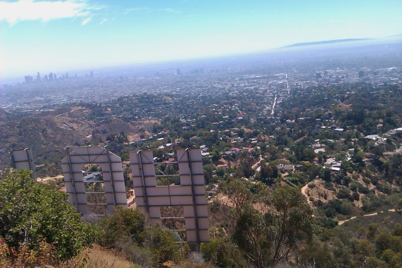 a scenic view from the top of a hill in a city