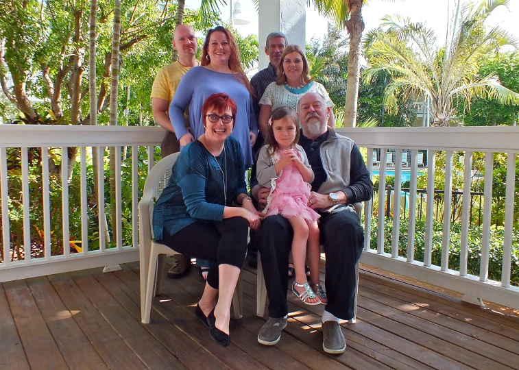 a group of people that are on a deck