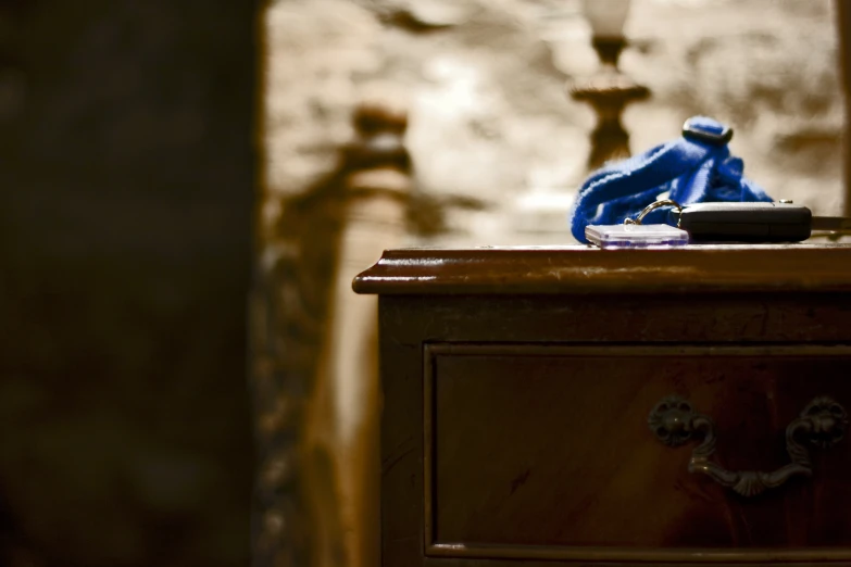 an open drawer on top of a wooden table