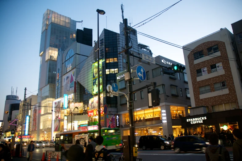 a city street with multiple buildings in the back ground