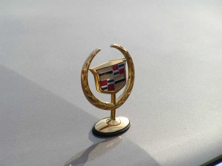 a fancy cadillac badge on a car