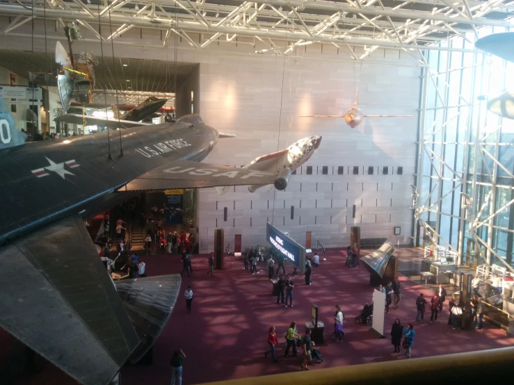 an airplane in the middle of a hangar