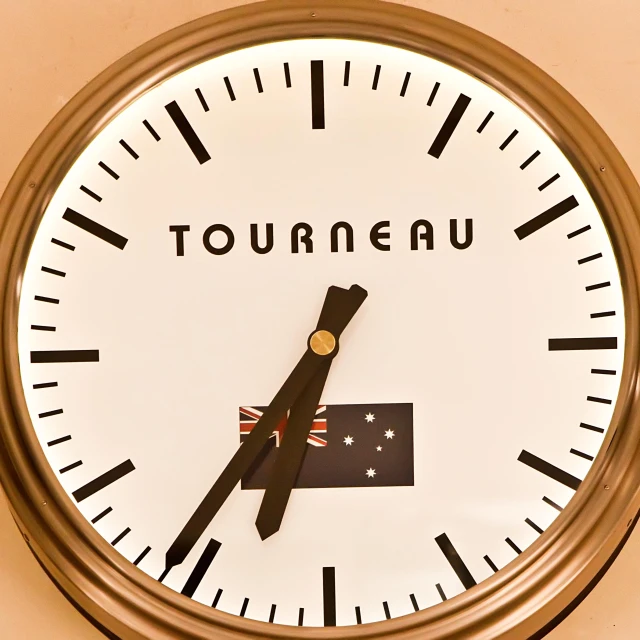 a clock that has some flags in the middle