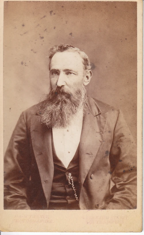 old black and white pograph of a man with a beard