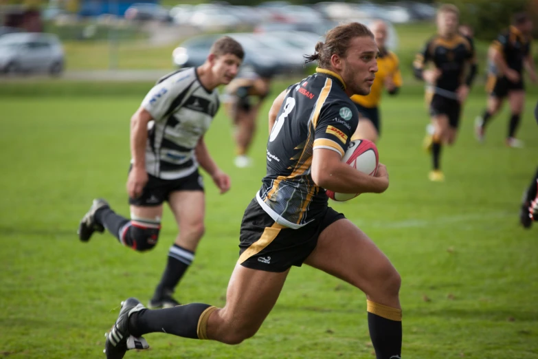 a man is running with a football