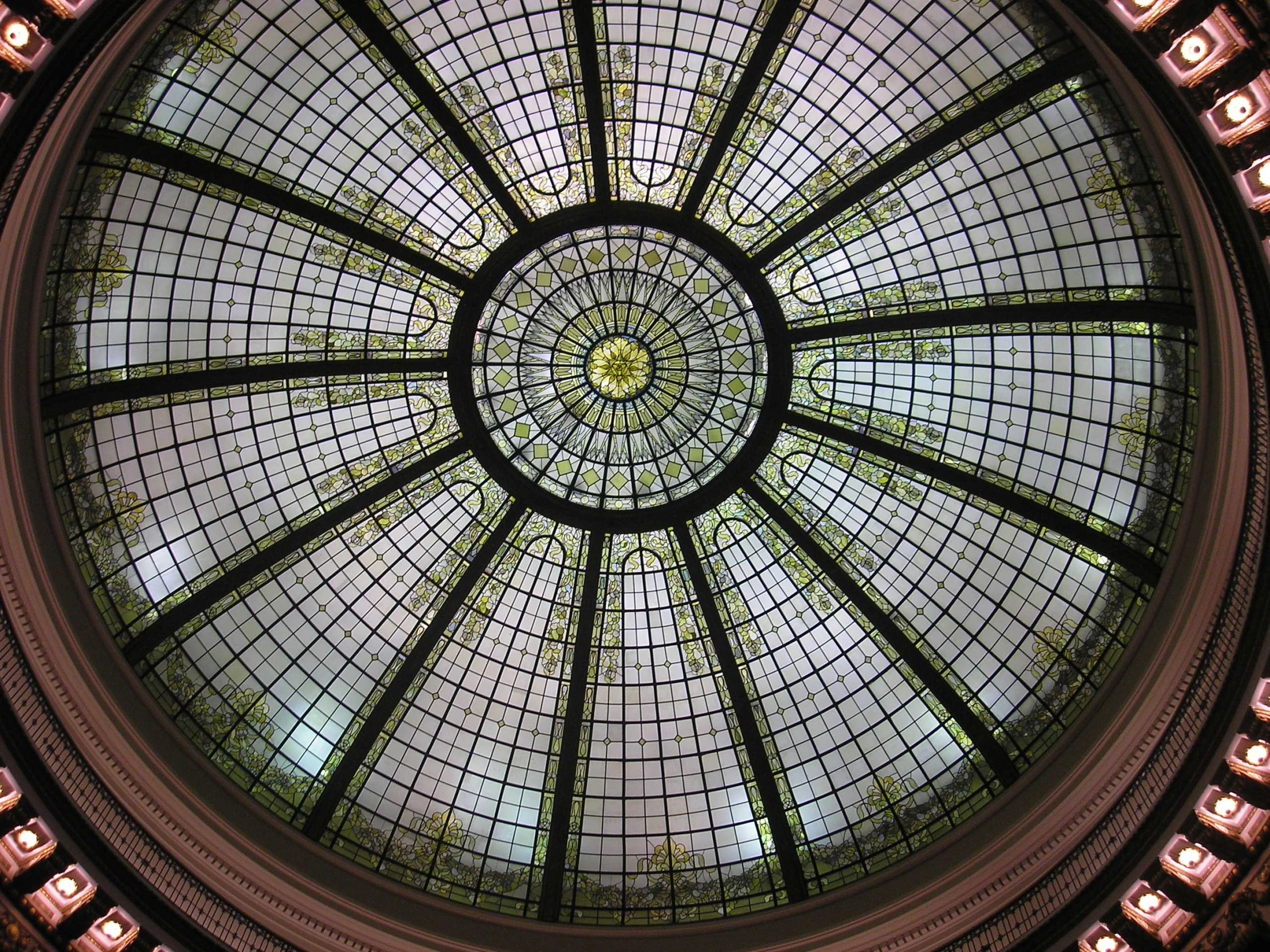 a circular ceiling with many light spots