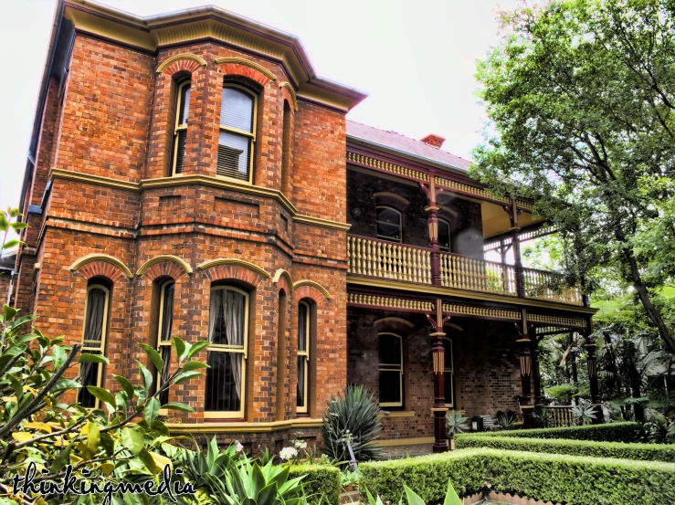 a large red brick building with many windows